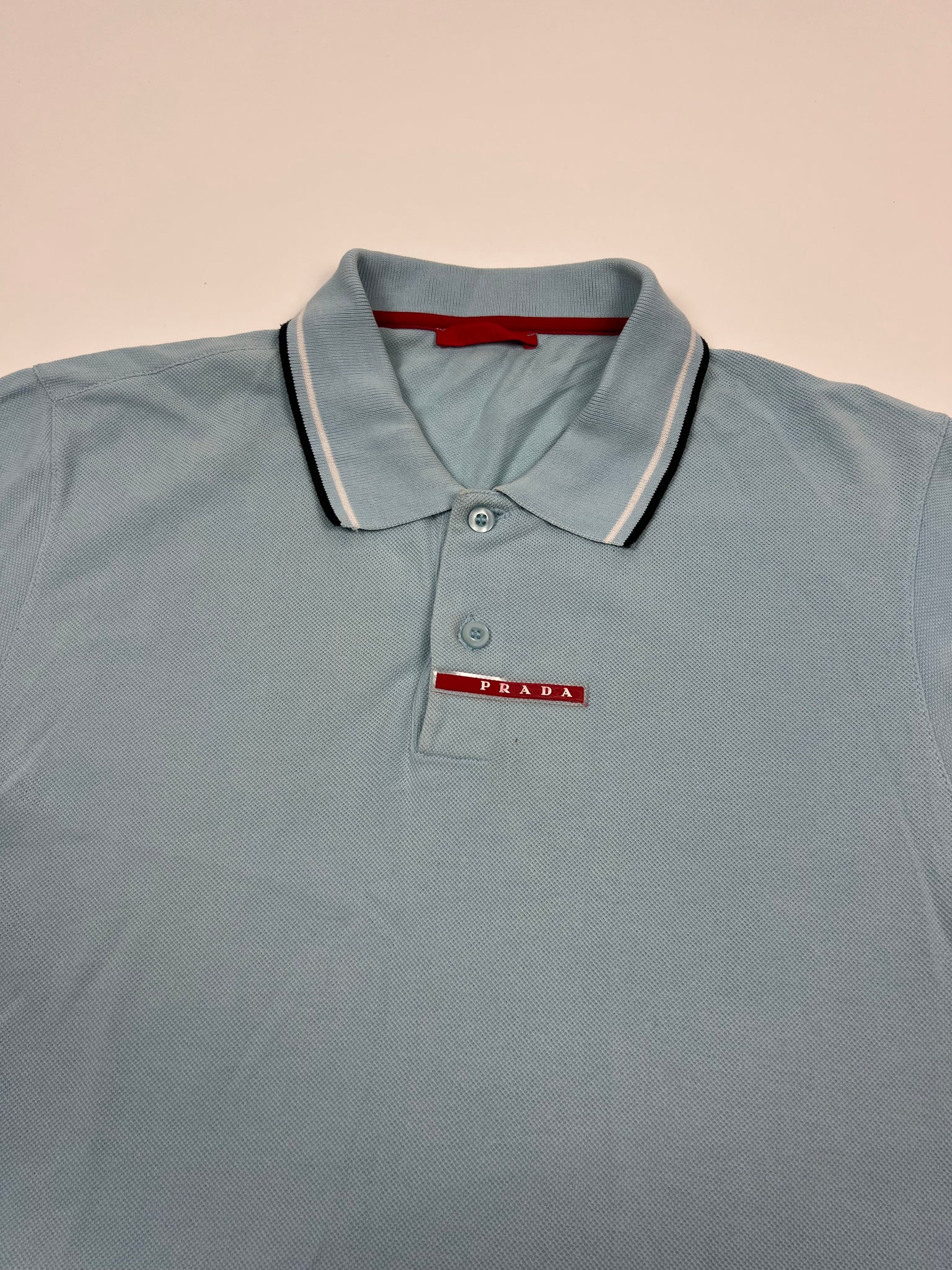 Prada Polo (L)