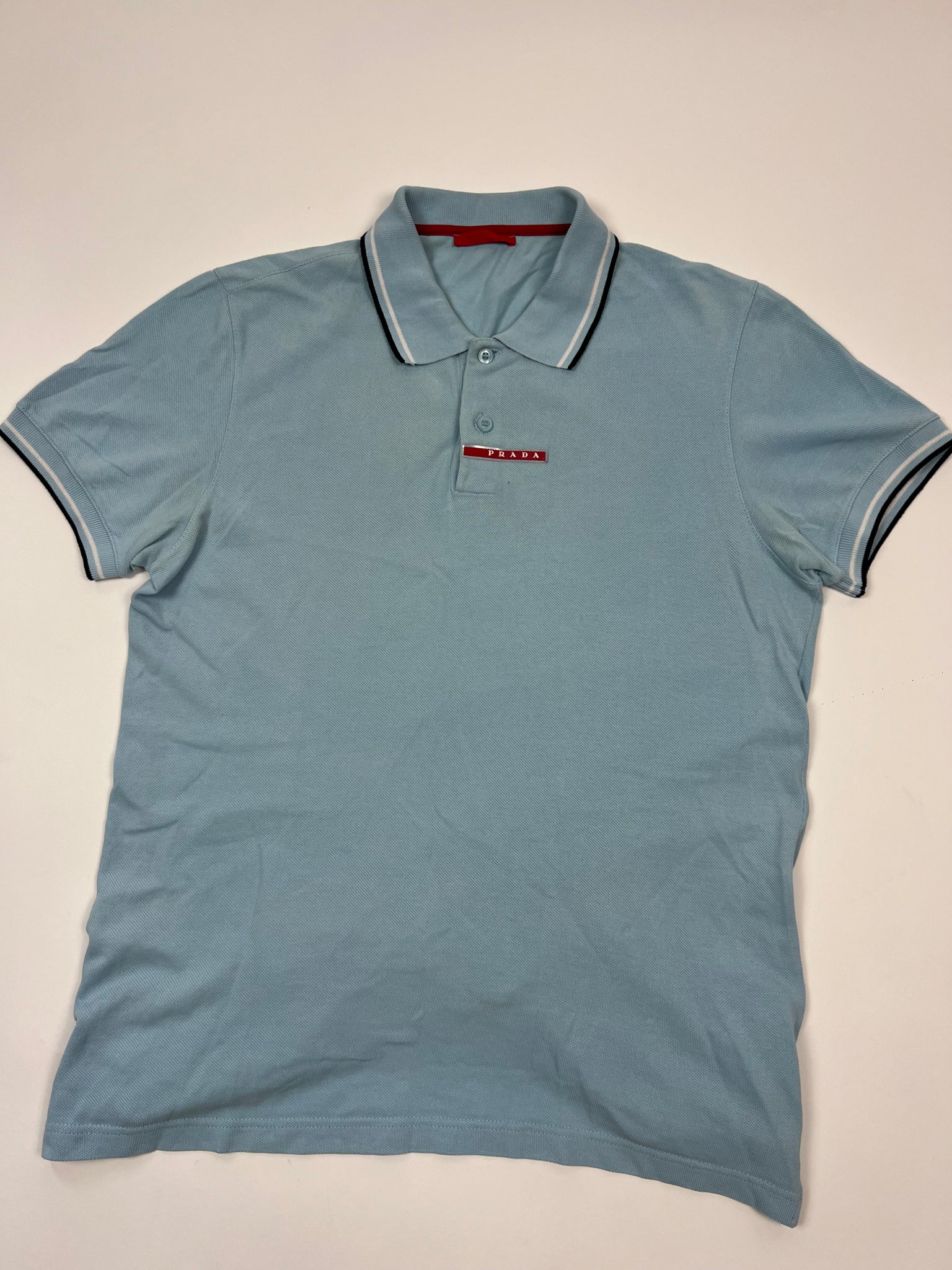 Prada Polo (L)