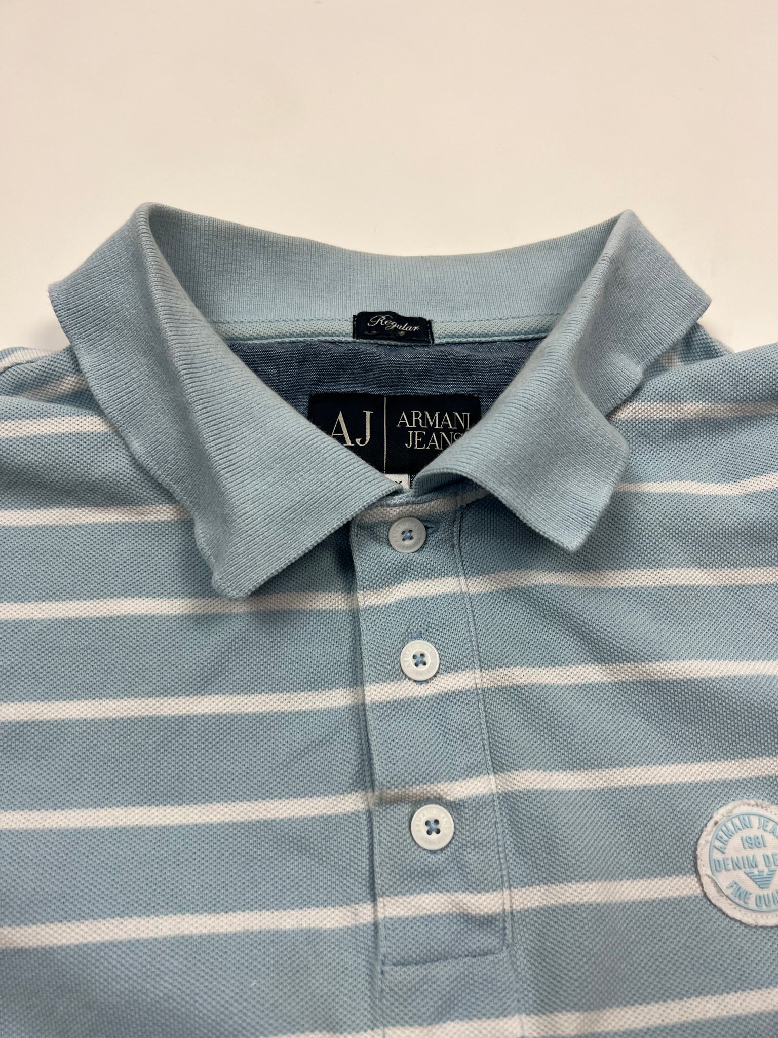 Armani Polo (L)